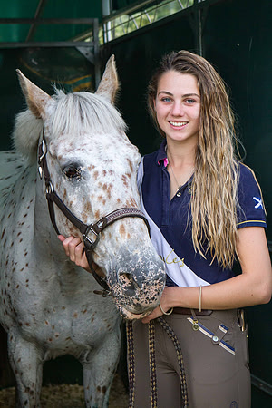 Sports portrait of jockey Eleanor Gudgin with her horse at the Blair Castle Horse Trails in Blair Atholl, Perthshire, Scotland.